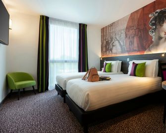 Hôtel Roi Soleil Prestige Plaisir - St Quentin - Plaisir - Спальня