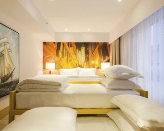 Caravel Hotel - Макао - Спальня