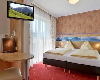 Hotel Alpenhof - Westendorf - Спальня
