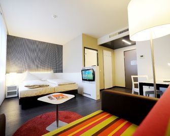 harry's home Dornbirn hotel & apartments - Dornbirn - Bedroom