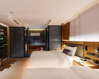 Tangrenju Designer Hotel (Yingtianmen Metro, Luoyang Ancient City) - Luoyang - Bedroom