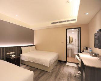 Chair Man Hotel - Taipei - Schlafzimmer