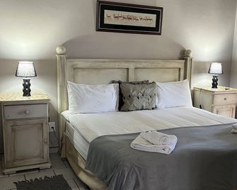 Hotel Pension Casa Africana - Windhoek - Phòng ngủ