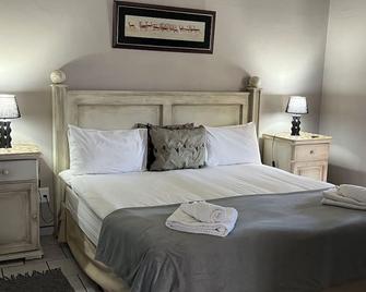 Hotel Pension Casa Africana - ווינדהוק - חדר שינה