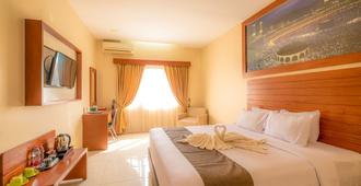 Assalaam Syariah Hotel - Surakarta City - Bedroom
