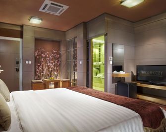 Amos Cozy Hotel Melawai - Jakarta - Chambre