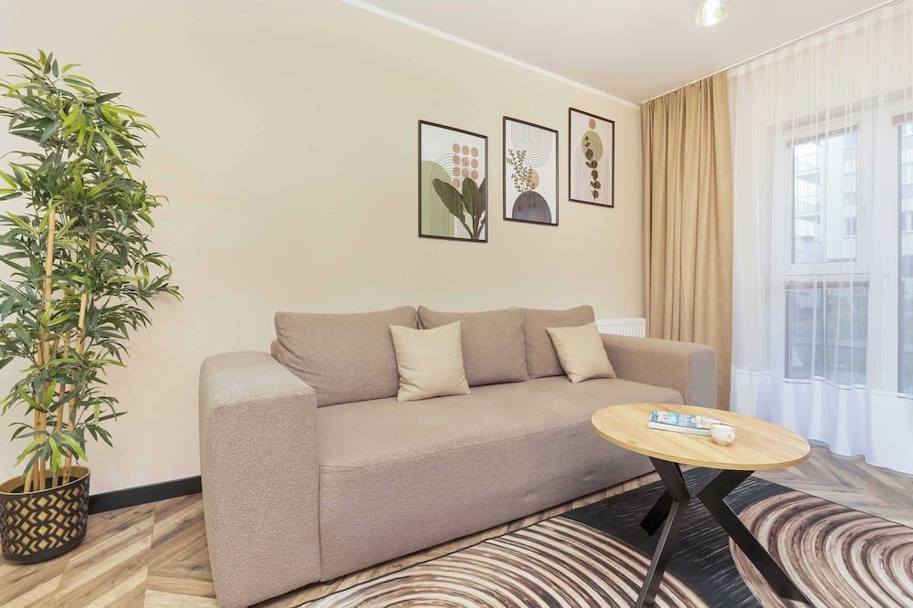 Jasny i Elegancki Apartament Pastelowa z Parkingiem by Noclegi Renters - غدانسك - غرفة معيشة