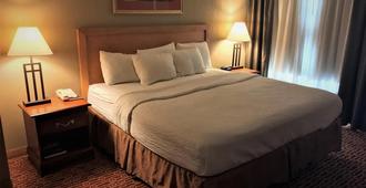 Host Inn All Suites - Wilkes-Barre - Bedroom