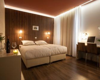 Eco Hotel Center - Adelsberg - Schlafzimmer