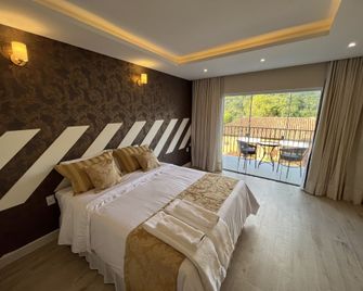 Pousada Granja Santa Barbara - פטרופוליס - חדר שינה