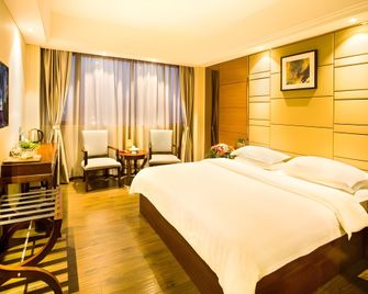 Greentree Inn Guangdong Jieyang Bus Terminal Station Ronghua Avenue Business Hotel - Jieyang - Camera da letto