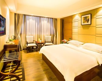 Greentree Inn Guangdong Jieyang Bus Terminal Station Ronghua Avenue Business Hotel - Jieyang - Bedroom