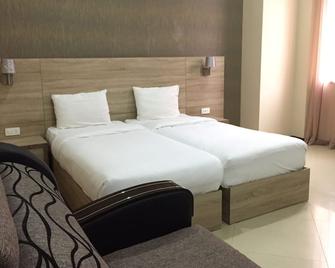 Primer Hotel - Eriwan - Schlafzimmer