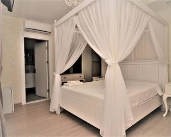Alacati Eldoris Hotel - Alacati - Kamar Tidur