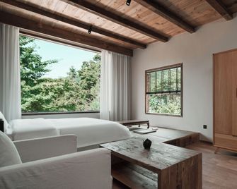 Emeishan Hetang Yunqi Tangquan Homestay - Meishan