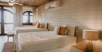 Tranquilseas Eco Lodge & Dive Center - Sandy Bay - Bedroom