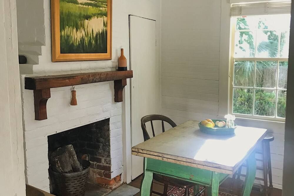 Dining room view of Lovingly Restored 1890 Historic Cottage
