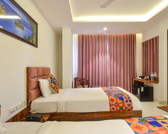 Prowell Hotel Apex Kondapur - Hyderabad - Bedroom