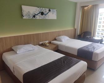 Hotel Metro Inn - Bangkok - Schlafzimmer