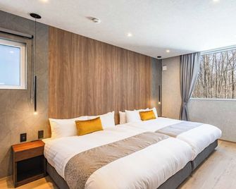 2 minutes free transfer to Rusutsu Resort111 2LD / Abuta-gun Hokkaidō - Kimobetsu - Slaapkamer