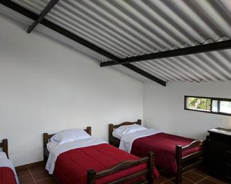 Hotel Huaka - Yo - San Agustín - Schlafzimmer