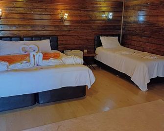 Angels Garden Hotel - Чіралі - Спальня