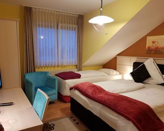 Legend Hotel - Gernsheim - Slaapkamer