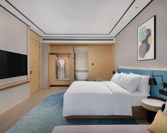 Hilton Garden Inn Rizhao High-Tech Zone - Rizhao - Schlafzimmer