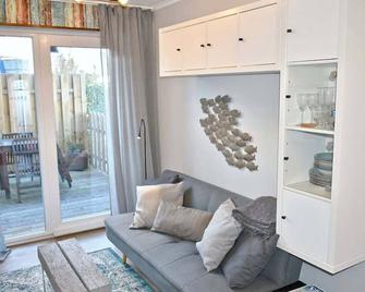 Lütt Hus an de See Ferienwohnung - Haffkrug - Wohnzimmer