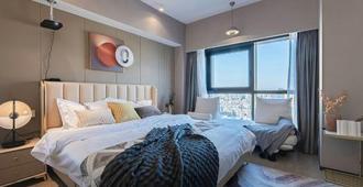 Yishen Diamond Hotel - Qiannan - Bedroom