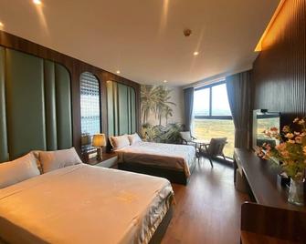 Apec Mandala Mui Ne Resorts & Hotels Nn - Phan Thiet - Schlafzimmer