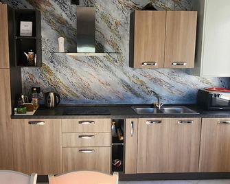 Kidonia - Iseo Lake Apartmens - Sale Marasino - Küche