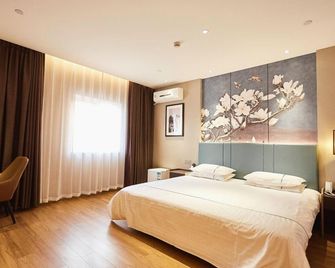Jinjiang Inn Cangzhou Railway Station - Cangzhou - Bedroom