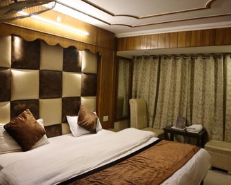 Hotel Krishiv Residency - Масурі - Спальня