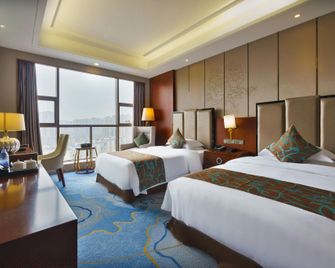 Nanchong Jin Hong Hotel - Nanchong - Bedroom