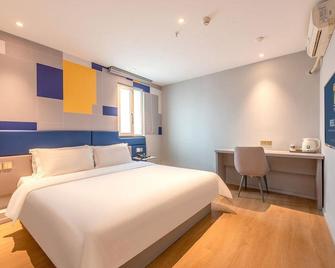 7 Days Inn Guangzhou Xinshi Branch - Kanton - Slaapkamer