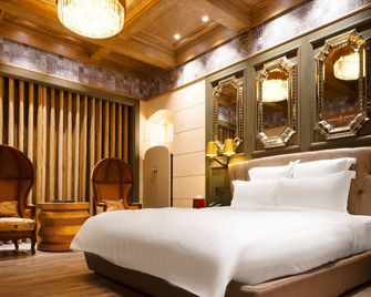 Royal Group Motel Jhong Hua Branch - Cao Hùng - Phòng ngủ