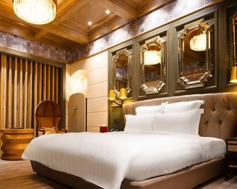 Royal Group Motel Jhong Hua Branch - Kaohsiung - Schlafzimmer