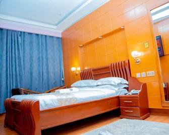 Bwami Dubai Hotel Kasulu - Makamba - Bedroom