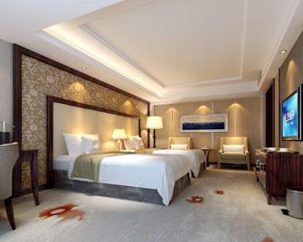 Jianke Holiday Hotel - Shiyan - Bedroom