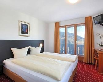 Hotel Central - Obersaxen Mundaun - Camera da letto