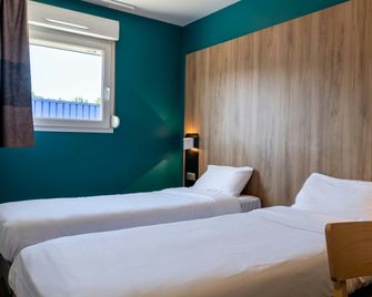 B&B HOTEL Saint-Etienne Monthieu - Saint-Étienne - Bedroom