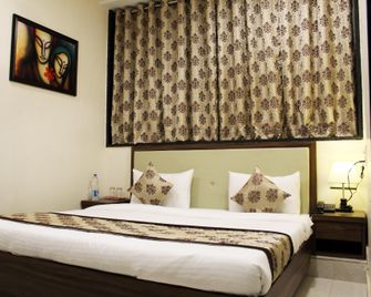 Lime Tree-Eco Inn Hotel - Jamnagar - Bedroom