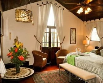 The Cariari Bed and Breakfast - Santa Bárbara de Heredia - חדר שינה