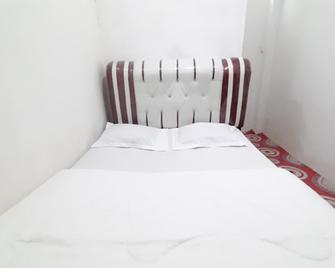 Homestay Cantika Koto Tengah Redpartner - Sungai Penuh - Habitación