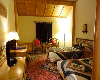 The Silk Road Dunhuang Hotel - Jiuquan - Bedroom