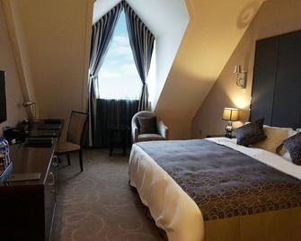 Venice Jianguo Hotel Dandong - Dandong - Bedroom
