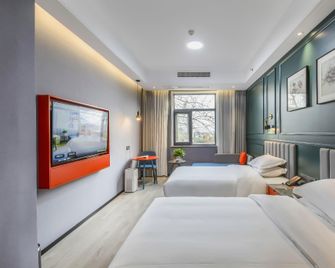 Xinyuan Jingzhi Hotel (Luoyang Yingtianmen Branch) - Luoyang - Soveværelse