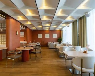 Renion City Hotel - 阿拉木圖 - 餐廳