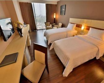 Hotel California Bandung - Bandung - Yatak Odası